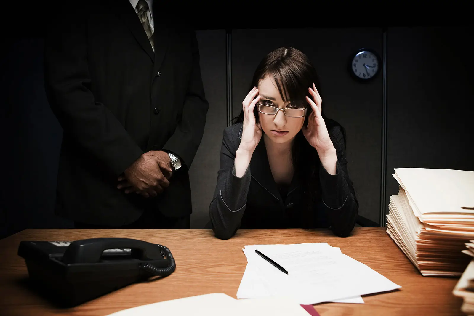 Person reviewing debt collection documents and class action lawsuit eligibility information